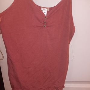 Tank with button top